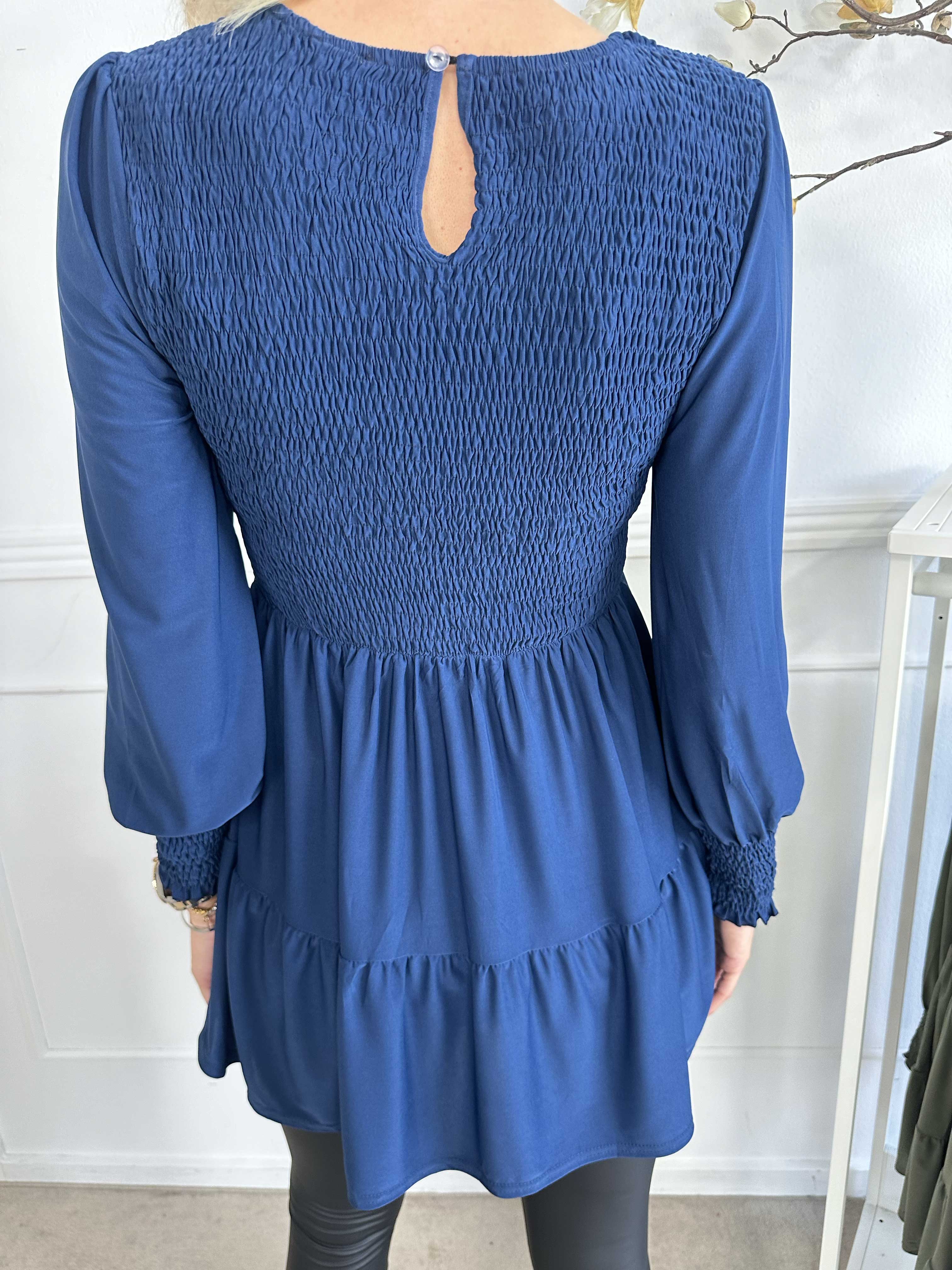 Kelly Shirt - Elastisk blus med smock över bröstet